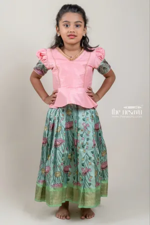 Premium Green Silk Pattu Pavadai with Salmon Pink Floral Cuffs and Banarasi Border for Girls